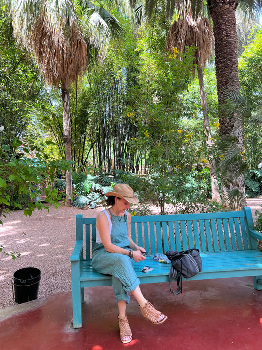 Gab on vacation in Morocco sitting on a bench