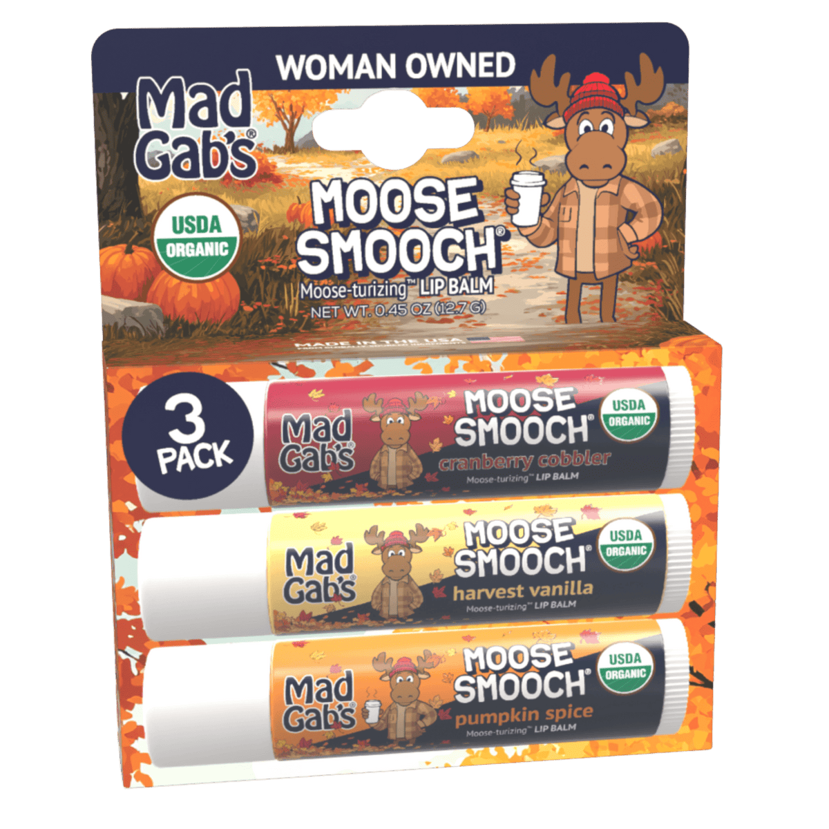 Mad Gab's Moose Smooch lip balm 3-pack in a retail display card. The packaging features an autumn-themed design with pumpkins, fall leaves, and a cartoon moose, showing three individual lip balms: cranberry cabber, harvest vanilla, and pumpkin spice.