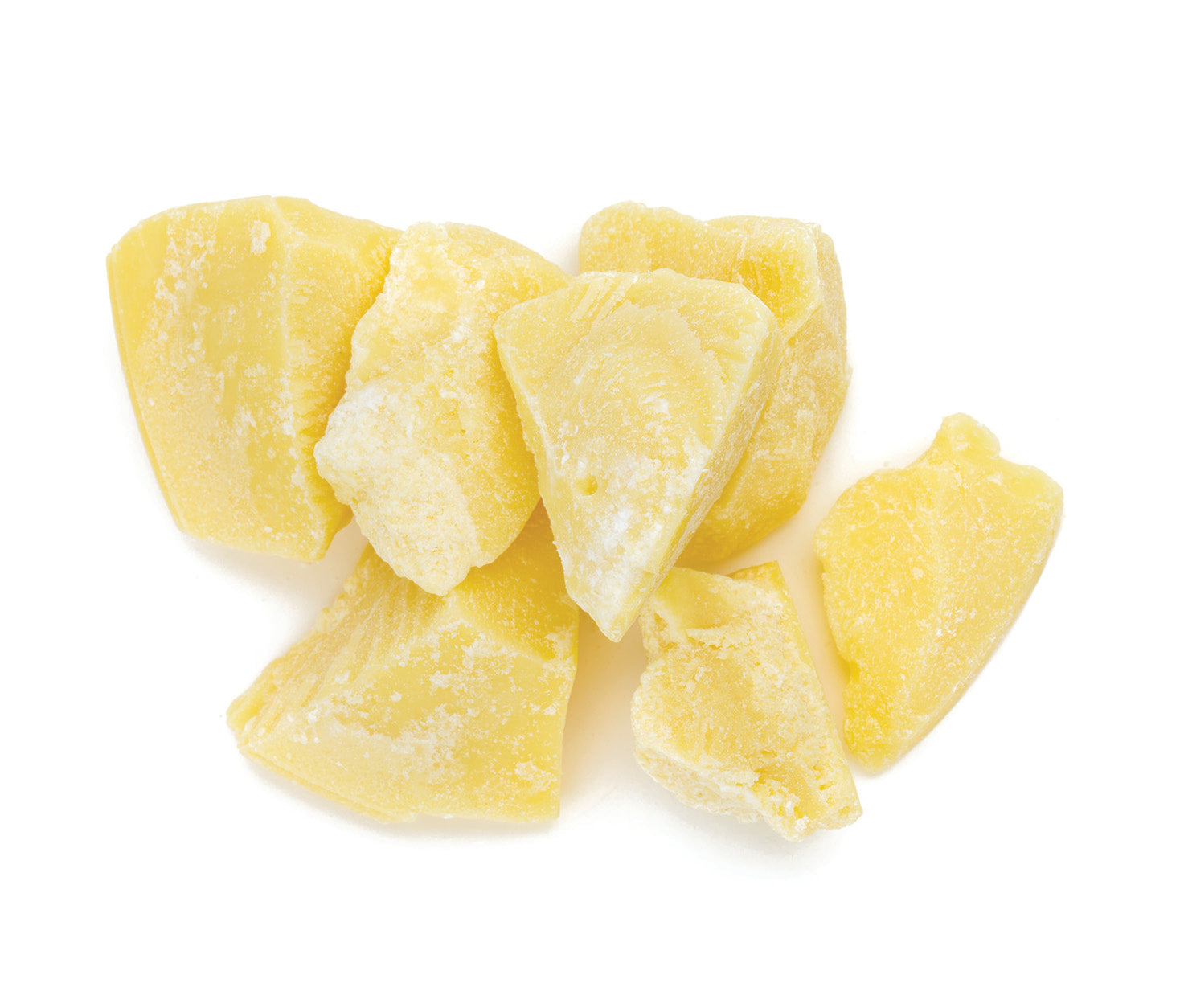 chunks of cocoa butter on a white surface