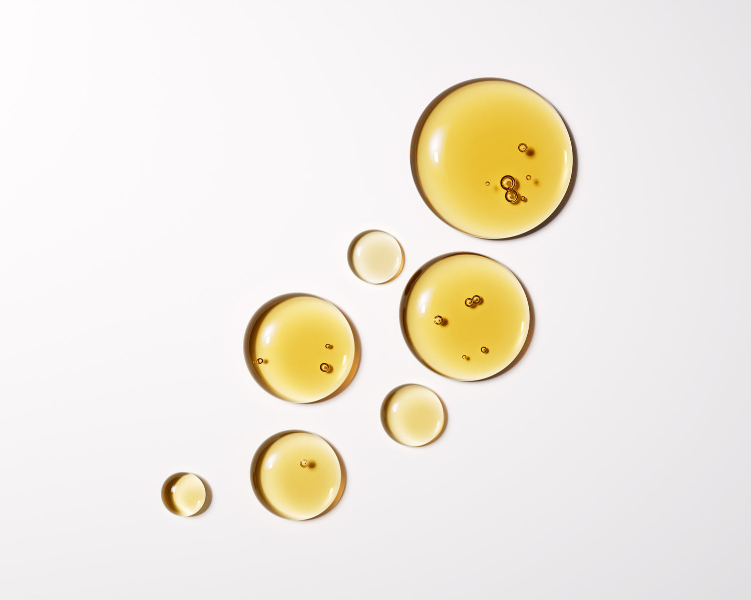 Yellow droplets on a white background